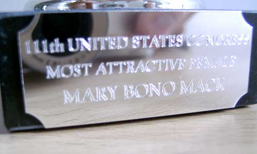 An engraving: 111th United States Congress, Most Attractive Female, Mary Bono Mack.